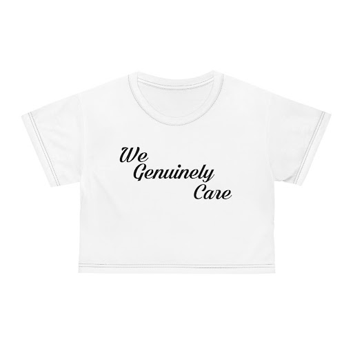 A white crop top with the words we genuinely care written on it.