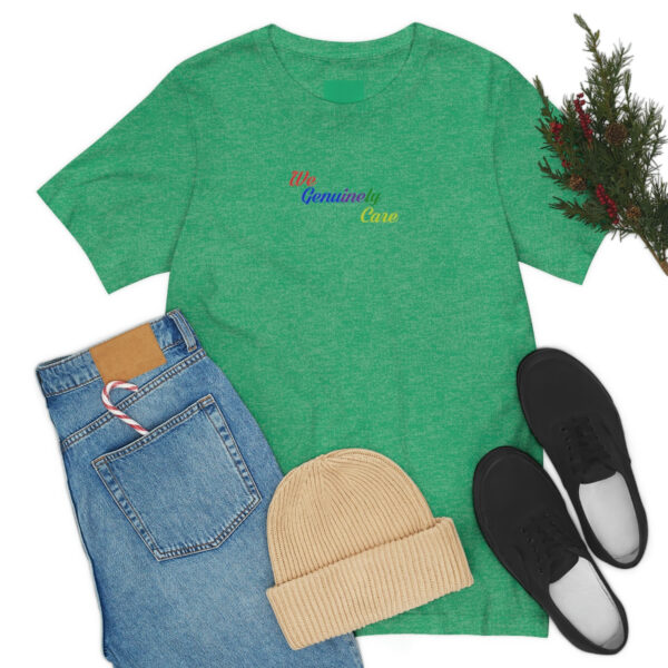 A green shirt and jeans with slippers