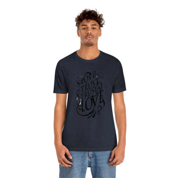 A man wearing a t-shirt with an image of a octopus.