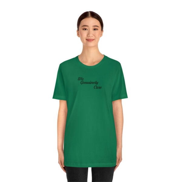 A woman wearing a green t-shirt with the words " tomorrow is today ".