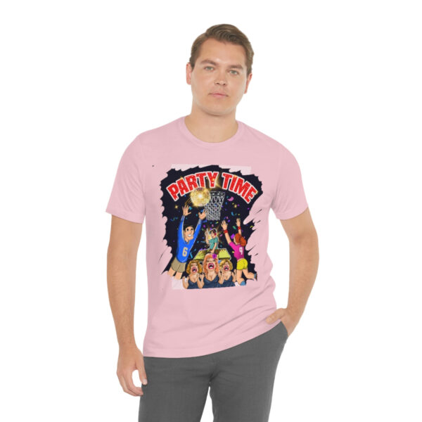 A man wearing a pink t-shirt with a cartoon of people.