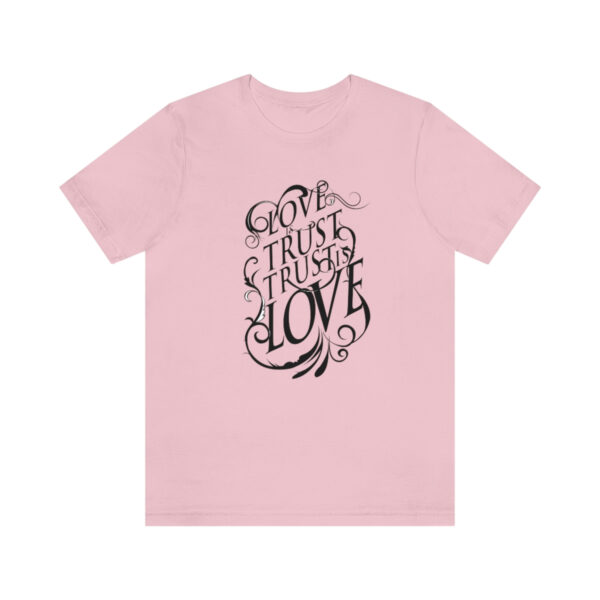 A pink t-shirt with the words " god trust us to love ".