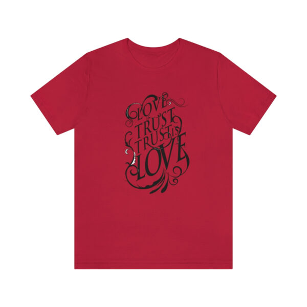 A red t-shirt with the words " love is in every language ".