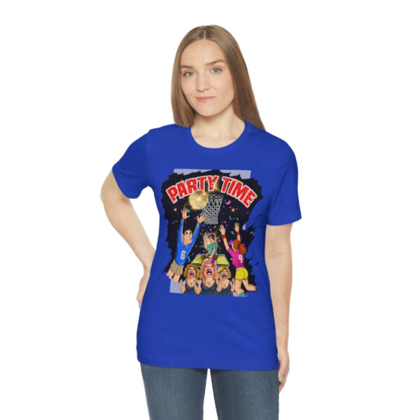 A woman wearing a blue t-shirt with an image of the scooby doo gang.