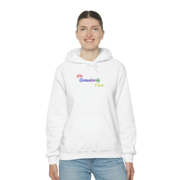 A woman wearing a white hoodie with the words " my favorite place ".