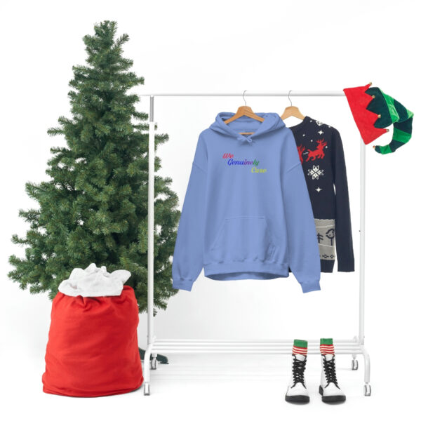 A clothes rack with some christmas themed items.