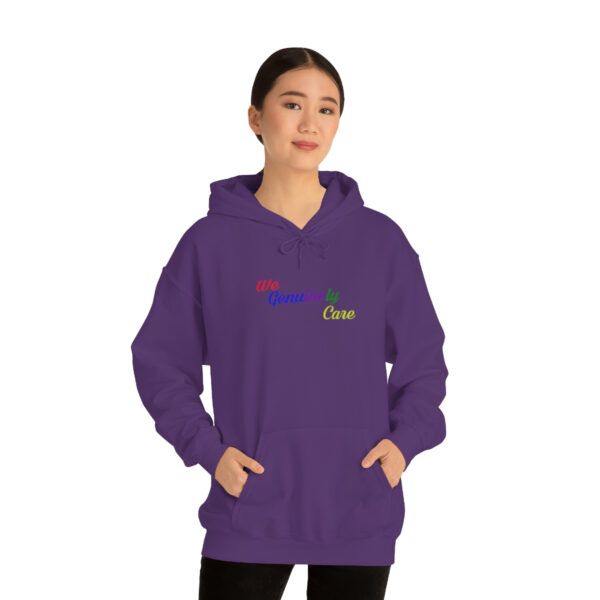 A woman in purple hoodie with the word " dance " on it.