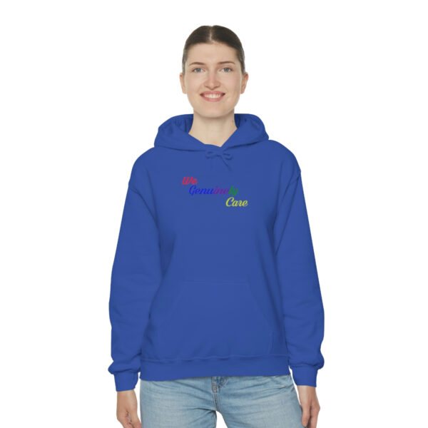 A woman wearing a blue hoodie with the word " love " on it.