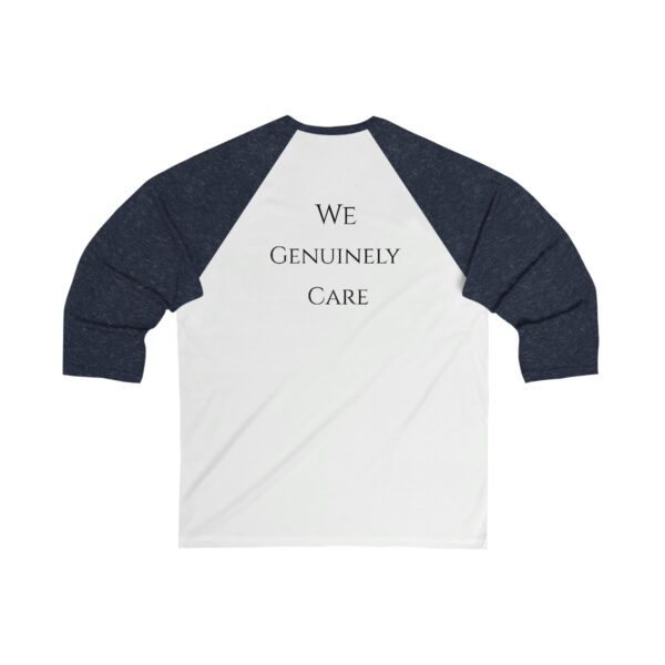 A white and black baseball shirt with the words we genuinely care