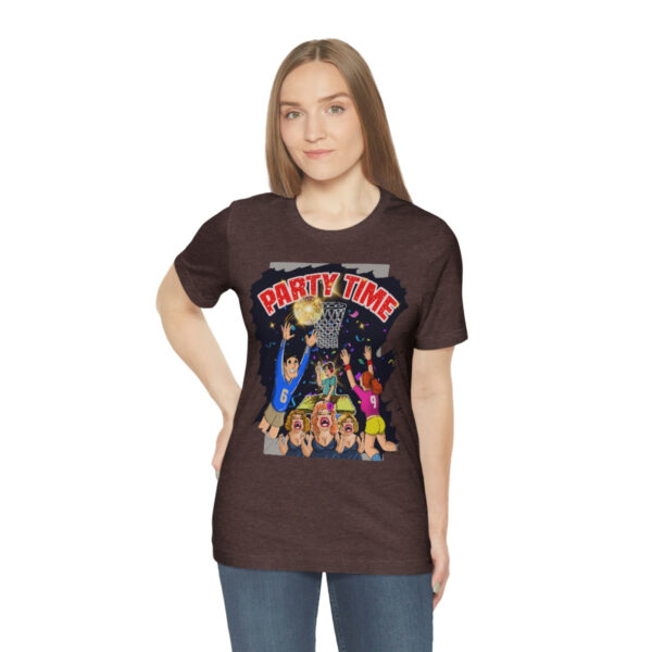 A woman wearing a brown t-shirt with cartoon characters on it.