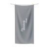 A towel hanging on a clothes line.