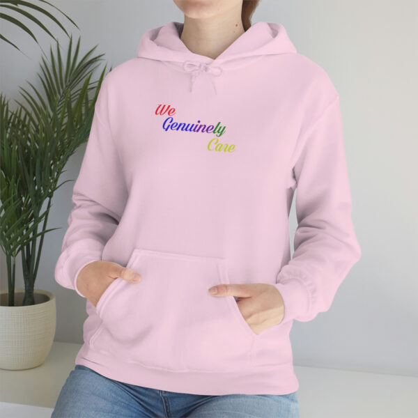 A woman wearing a pink hoodie with the words " seriously fun ".