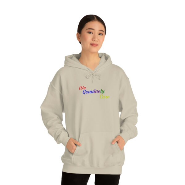 A woman in a white hoodie with the word " creativity " on it.