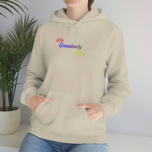 A person wearing a hoodie with the words " dominively " on it.