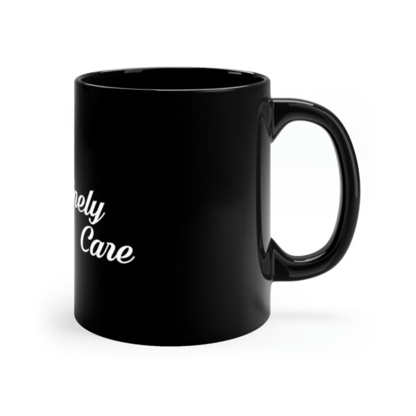 A black coffee mug with the words simply care on it.