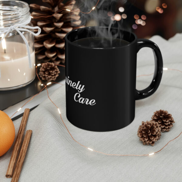 A black coffee mug with smoke coming out of it.