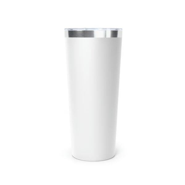 A white cup with a silver rim on top of it.