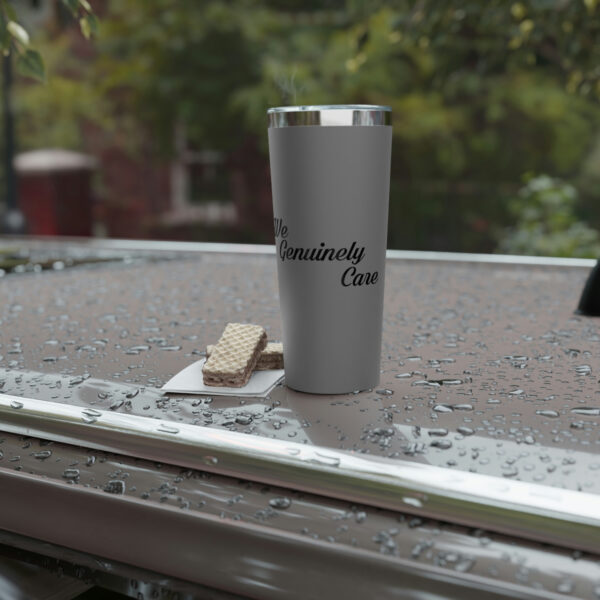 A cup of coffee on the window sill