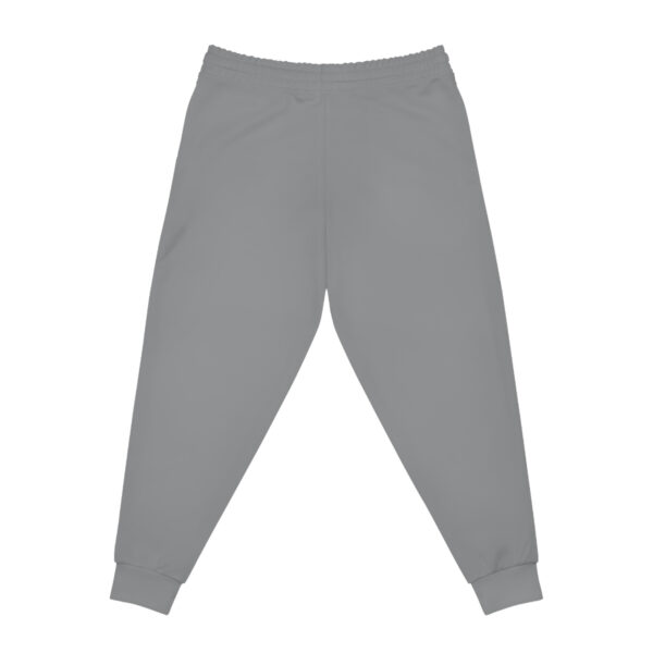 A pair of grey sweatpants with a white logo on the front.