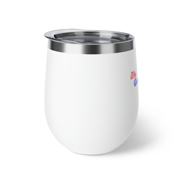 A white cup with a red and blue star on it.