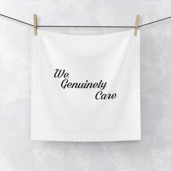 A towel hanging on a clothes line with the words " we genuinely care ".