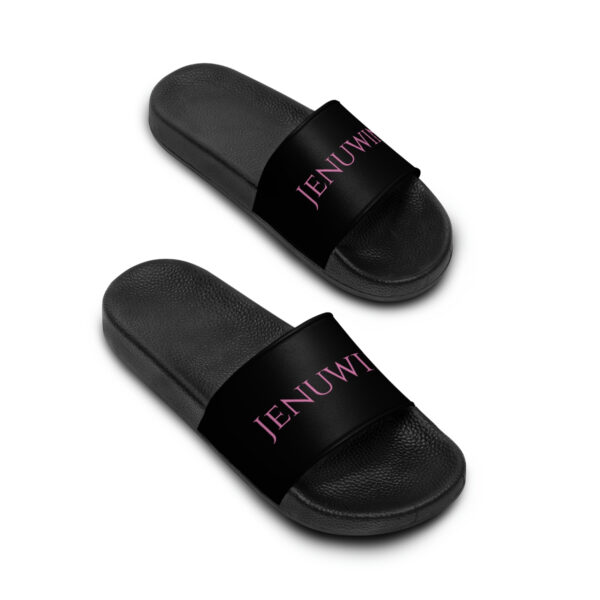 A pair of black slides with the word jenuwi written on them.