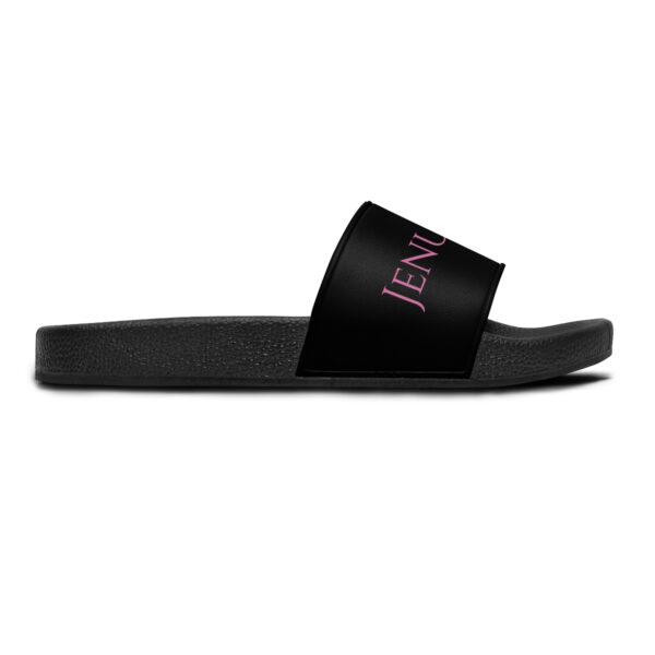 A pair of black slides with the word jenni written on them.