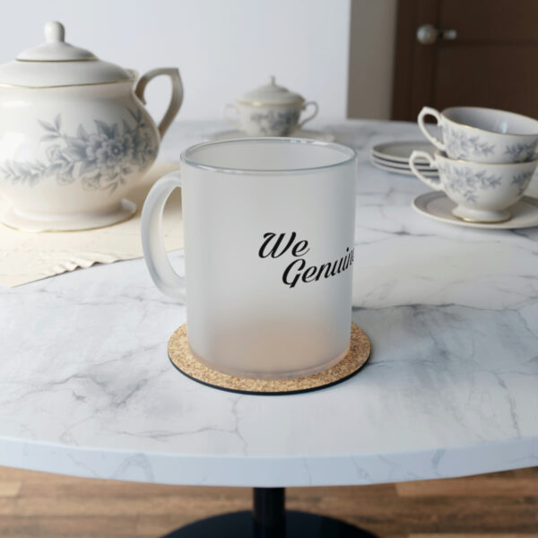 A coffee mug sitting on top of a table.