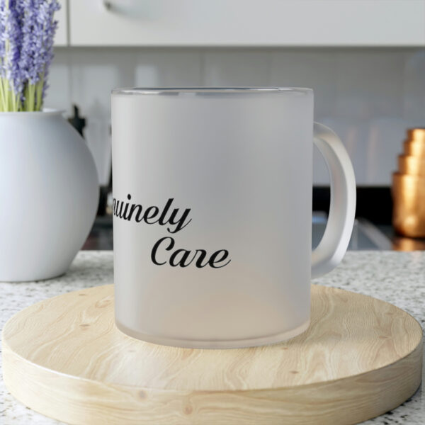 A frosted coffee mug sitting on top of a wooden board.