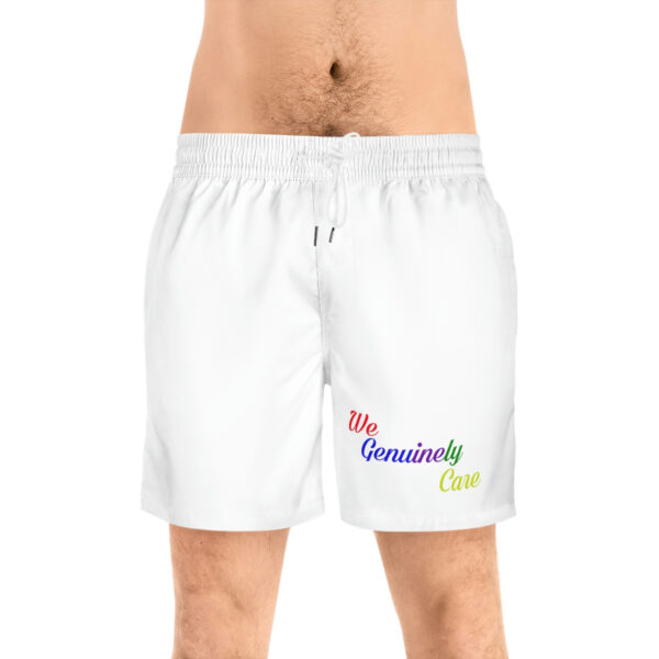 A man wearing white shorts with the words " be gracious to me ".