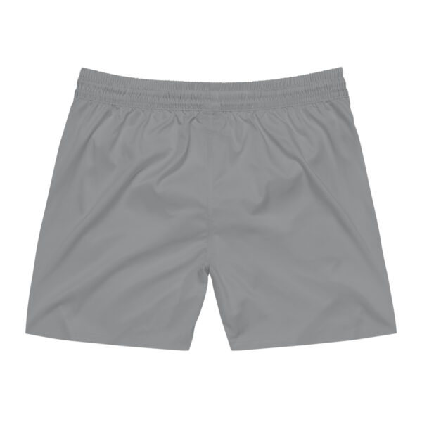 A pair of gray shorts with a white logo on the side.