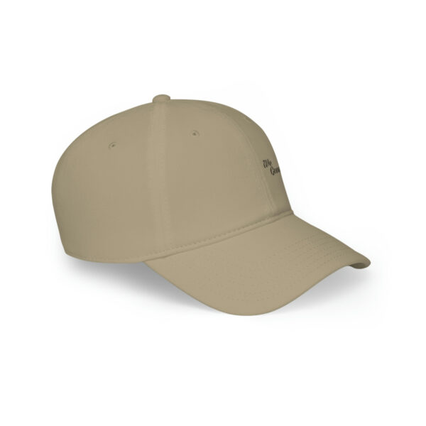 A beige hat with a white logo on it.