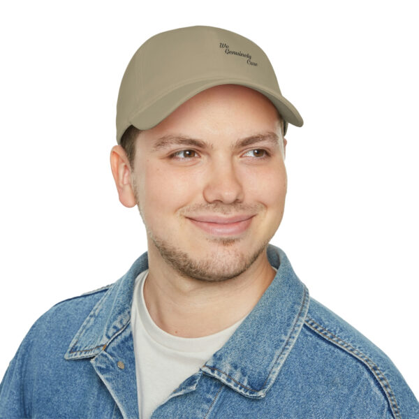 A man wearing a hat and jeans.