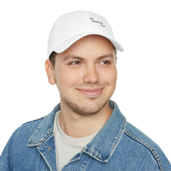 A man wearing a white hat and denim jacket.