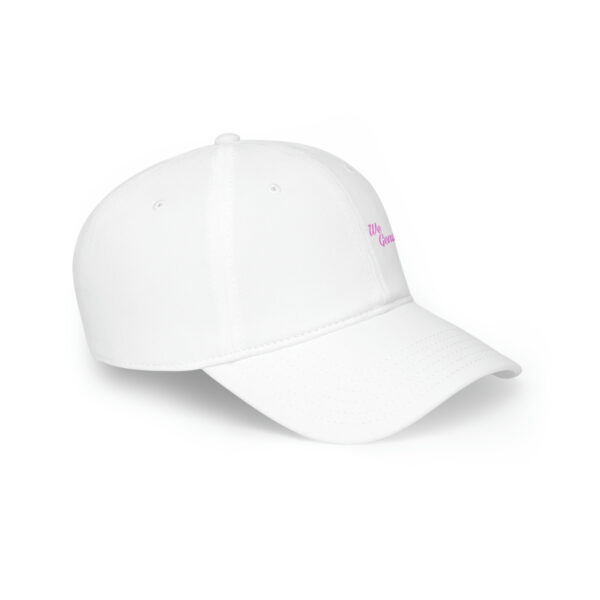 A white hat with pink lettering on it.