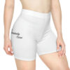 A woman wearing white shorts with the words " somebody close " on it.