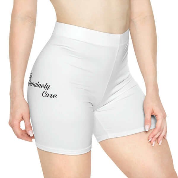 A woman wearing white shorts with the words " somebody close " on it.