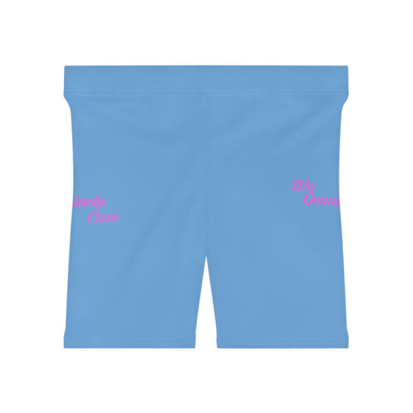 A pair of blue shorts with pink writing on them.